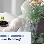 Elegant facade with vertical siding and trees with text How Biosourced Materials Support Green Building?