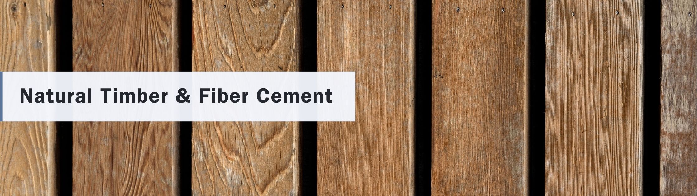 Natural timber and fiber cement cladding materials commonly used in exterior facade applications