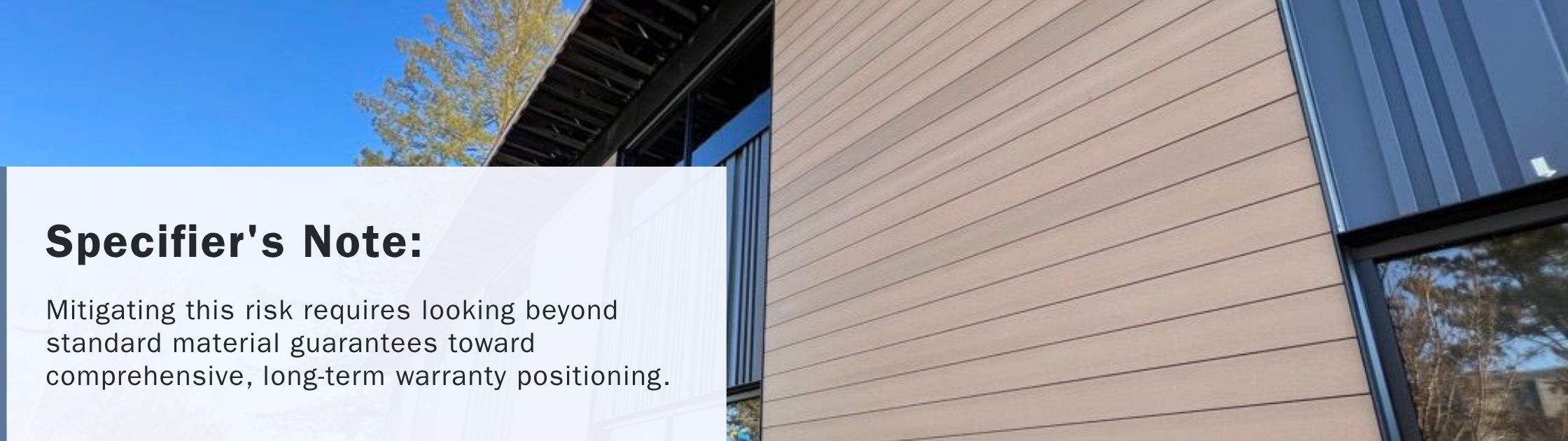 Close-up of Novano composite cladding used in a commercial building emphasizing long-term durability and warranty-backed performance.